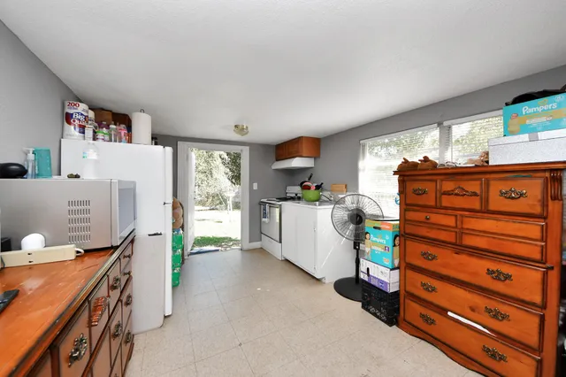 a room with furniture and a window