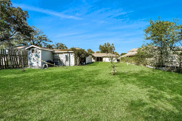 a house view with a garden space