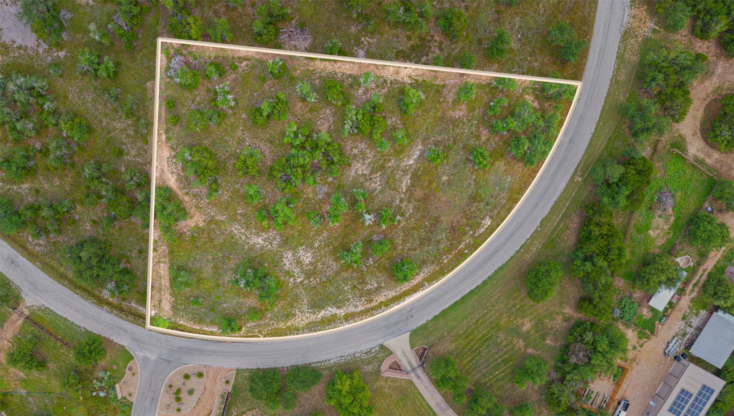 32000 Mirela Ann Road Dripping Springs, TX 78620 - Photo 2 of 12 A spacious lot offering abundant greenery and a prime location for development.