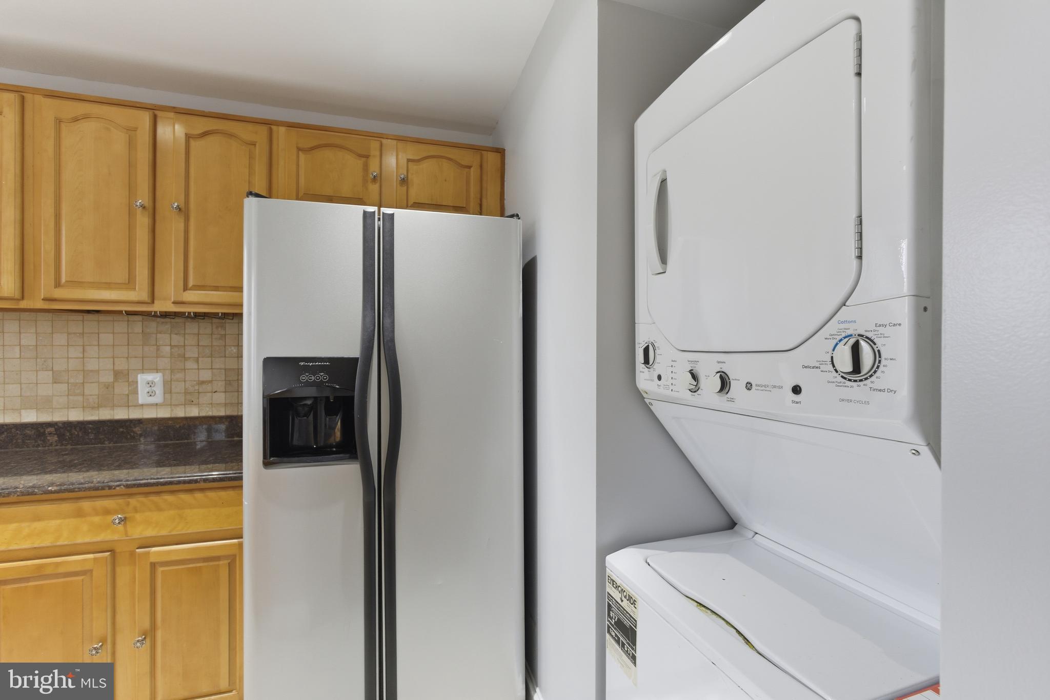 3872 9th Street Southeast, Unit 201 Washington, DC 20032 - Photo 14 of 17 a utility room with dryer and washer