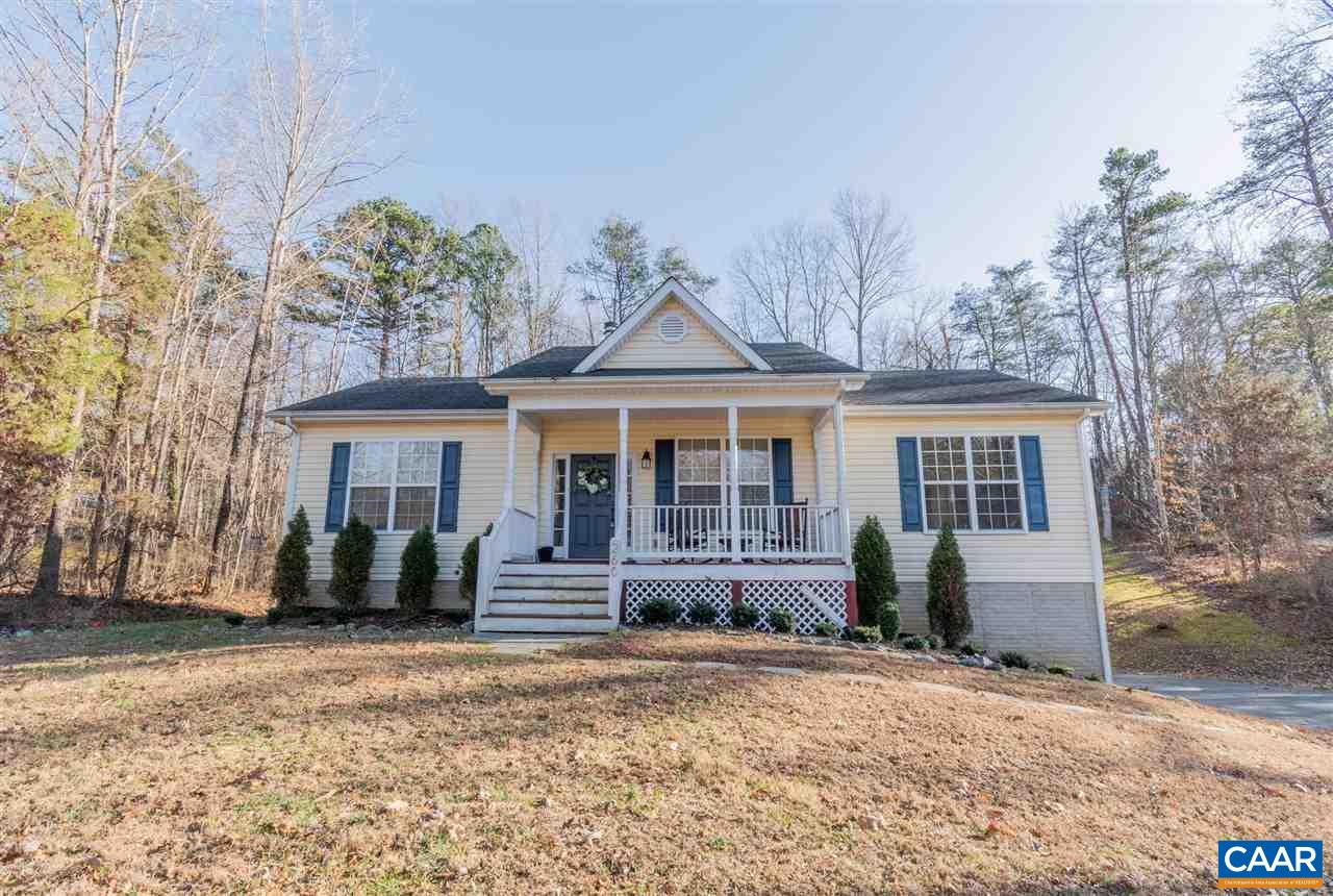 260 Geranium Road Ruckersville, VA 22968 - Photo 1 of 32 a front view of a house with garden
