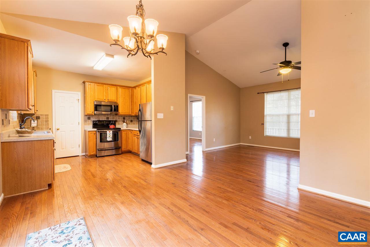 260 Geranium Road Ruckersville, VA 22968 - Photo 13 of 32 a view of a kitchen with furniture and a window