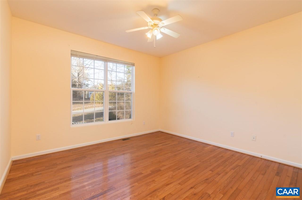 260 Geranium Road Ruckersville, VA 22968 - Photo 24 of 32 a view of empty room with wooden floor and fan