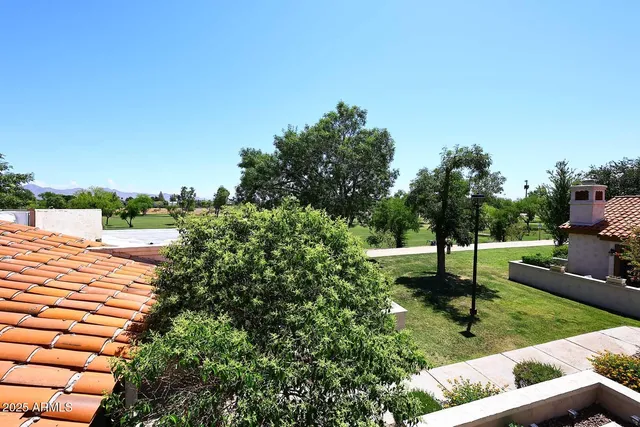a view of a garden with trees