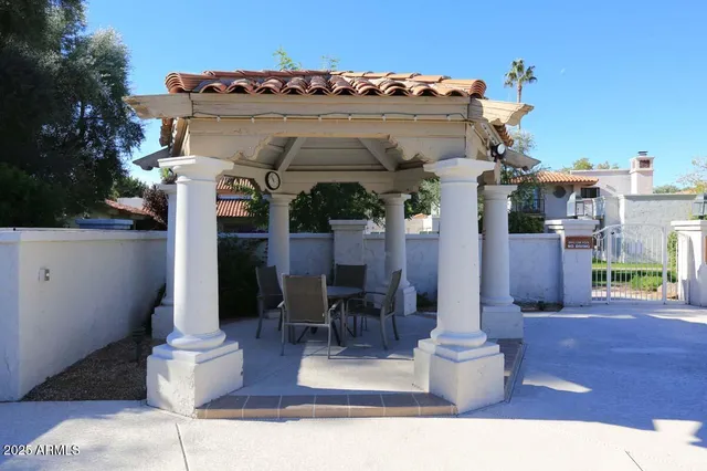 a view of a swimming pool with chairs