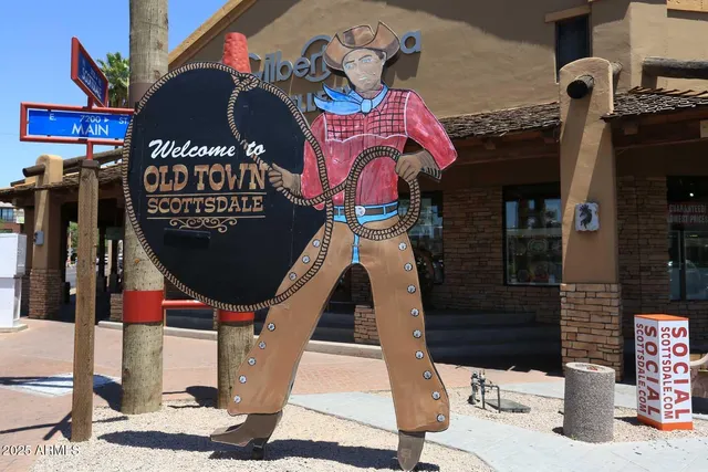 a view of house with outdoor space and sitting area