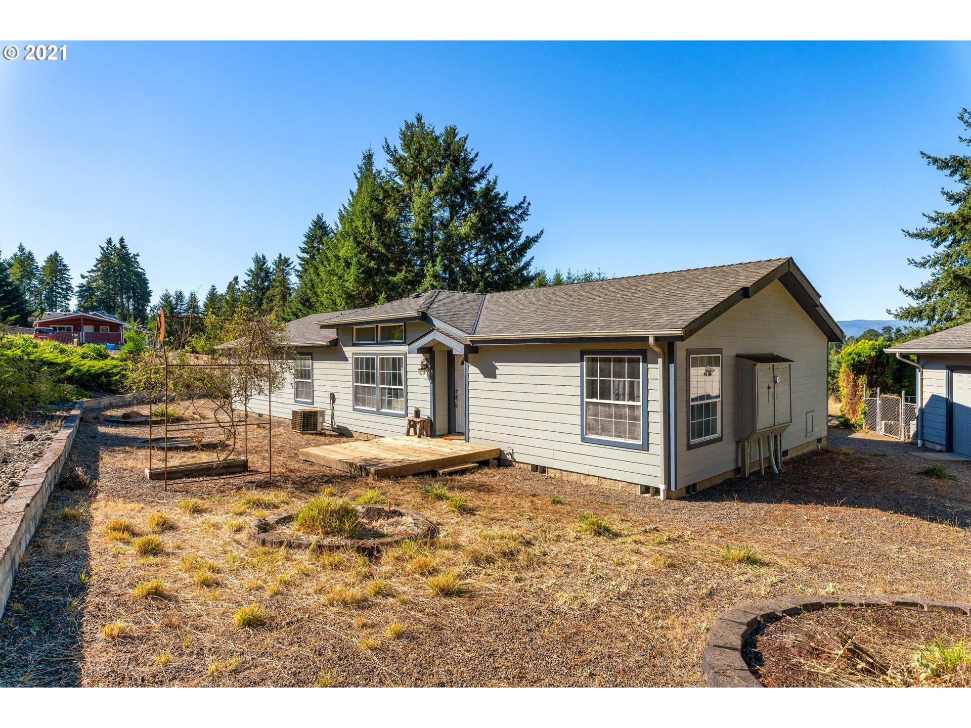 15010 Ferns Corner Road Dallas, OR 97338 - Photo 2 of 32 a house view with a outdoor space