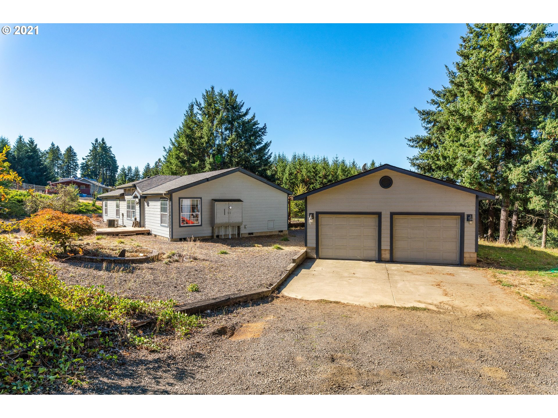15010 Ferns Corner Road Dallas, OR 97338 - Photo 3 of 32 a house view with a outdoor space