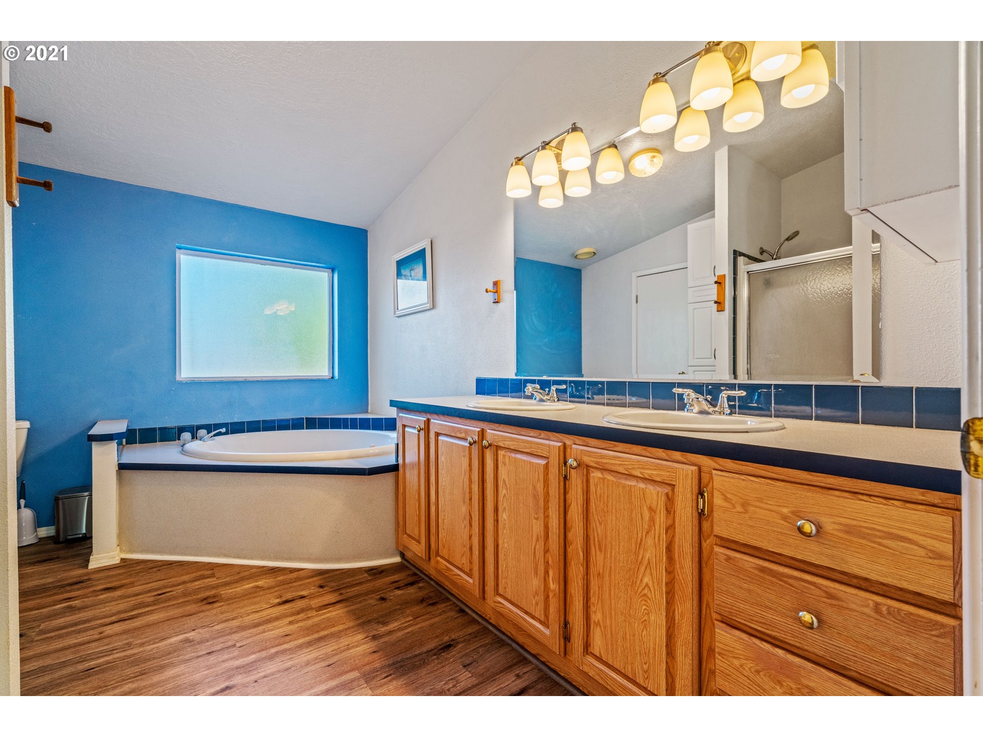 15010 Ferns Corner Road Dallas, OR 97338 - Photo 25 of 32 a view of a kitchen with cabinet and mirror