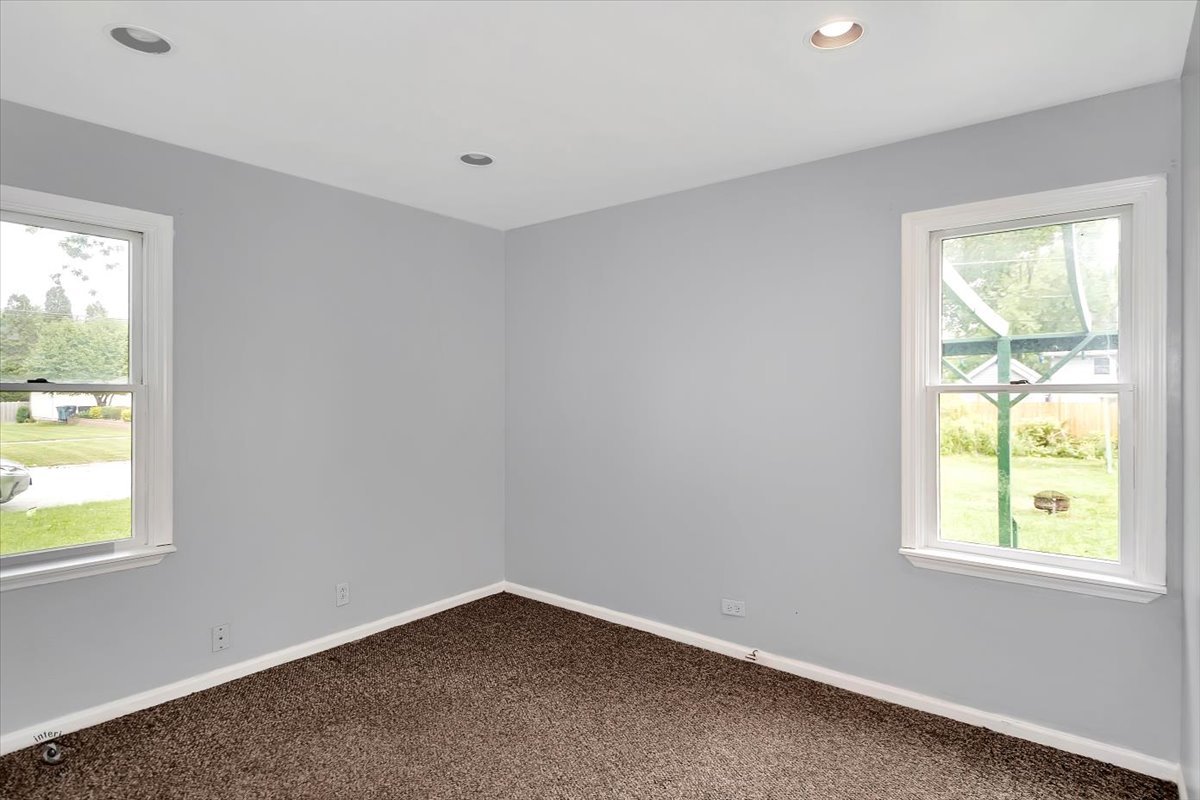 14301 Kilpatrick Avenue Midlothian, IL 60445 - Photo 12 of 22 an empty room with windows