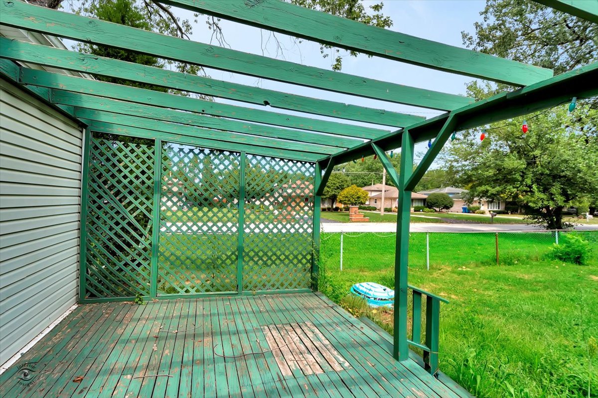 14301 Kilpatrick Avenue Midlothian, IL 60445 - Photo 19 of 22 a view of a backyard with a garden