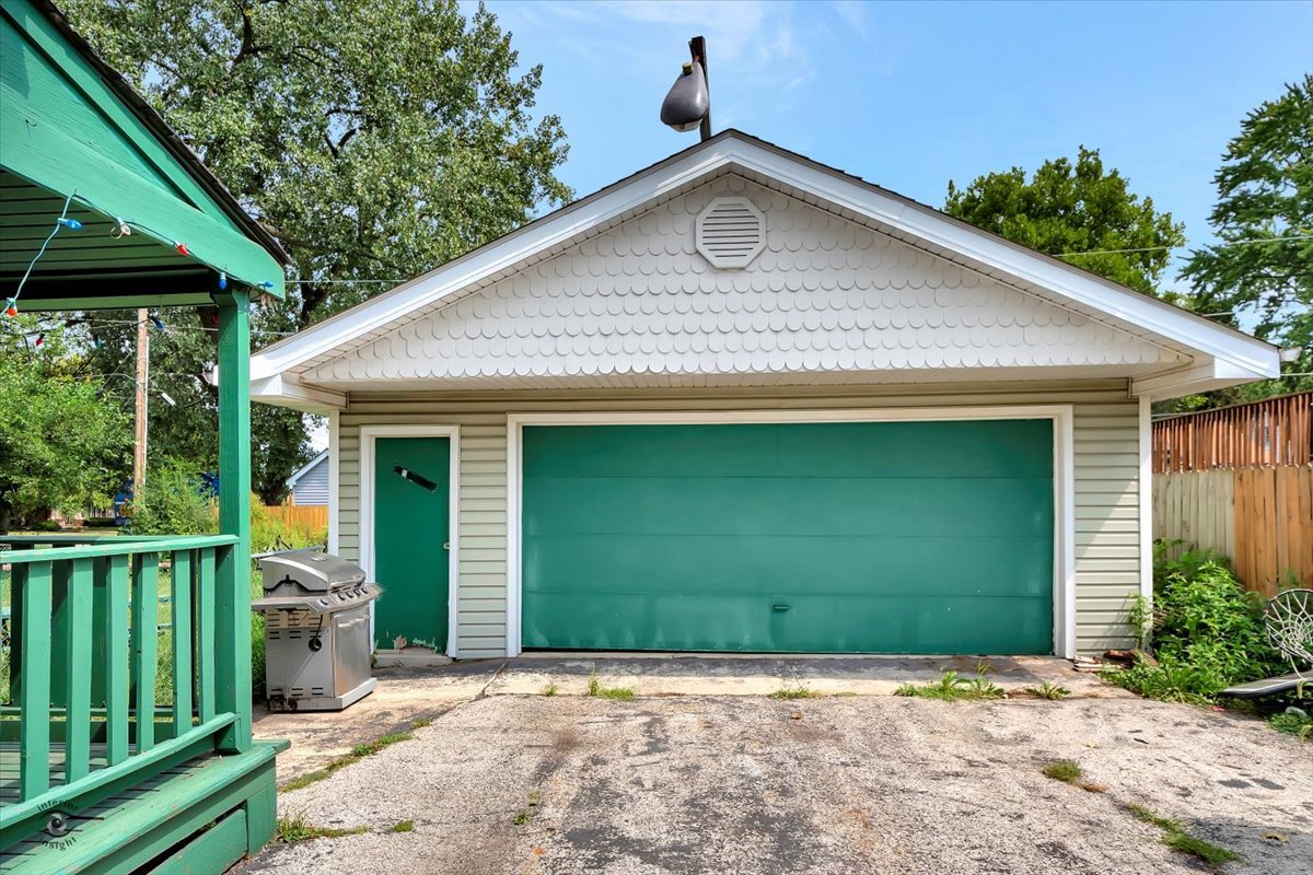 14301 Kilpatrick Avenue Midlothian, IL 60445 - Photo 22 of 22 a front view of a house with a yard