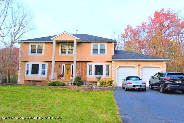 766 Anderson Road Jackson, NJ 08527 - Photo 1 of 21 a car parked in front of a house