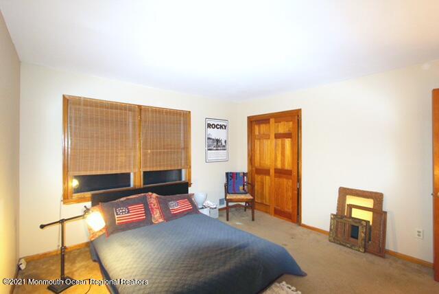 766 Anderson Road Jackson, NJ 08527 - Photo 16 of 21 a bedroom with a bed and wooden floor