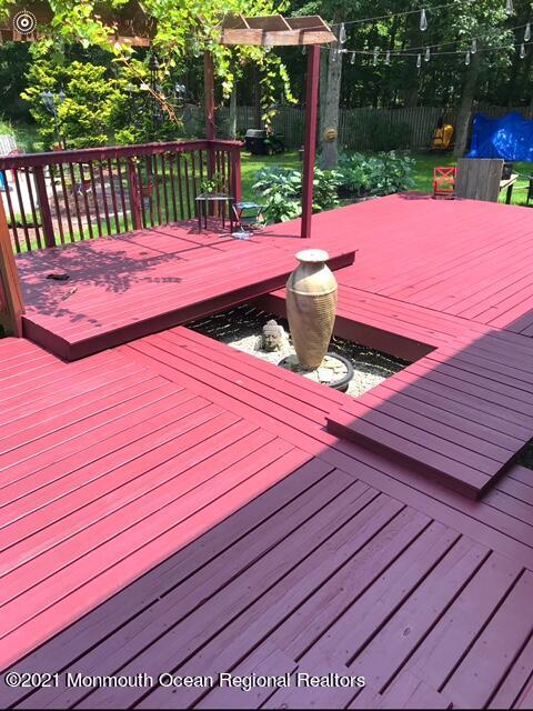766 Anderson Road Jackson, NJ 08527 - Photo 20 of 21 a view of a wooden deck with a yard