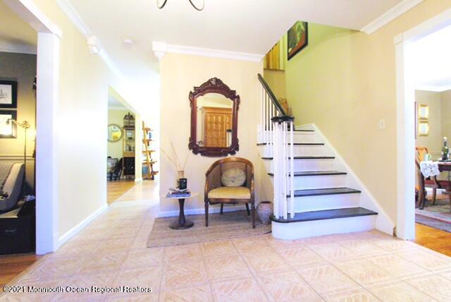 766 Anderson Road Jackson, NJ 08527 - Photo 6 of 21 a view of staircase with furniture and a painting