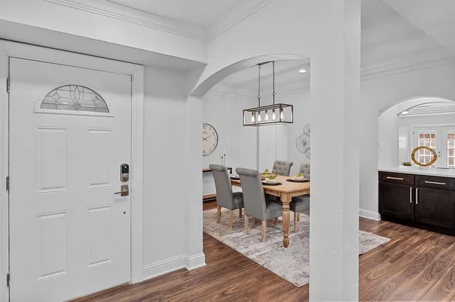 a view of a kitchen from the dinning room