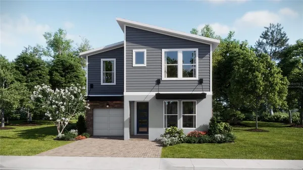 front view of a house with a yard