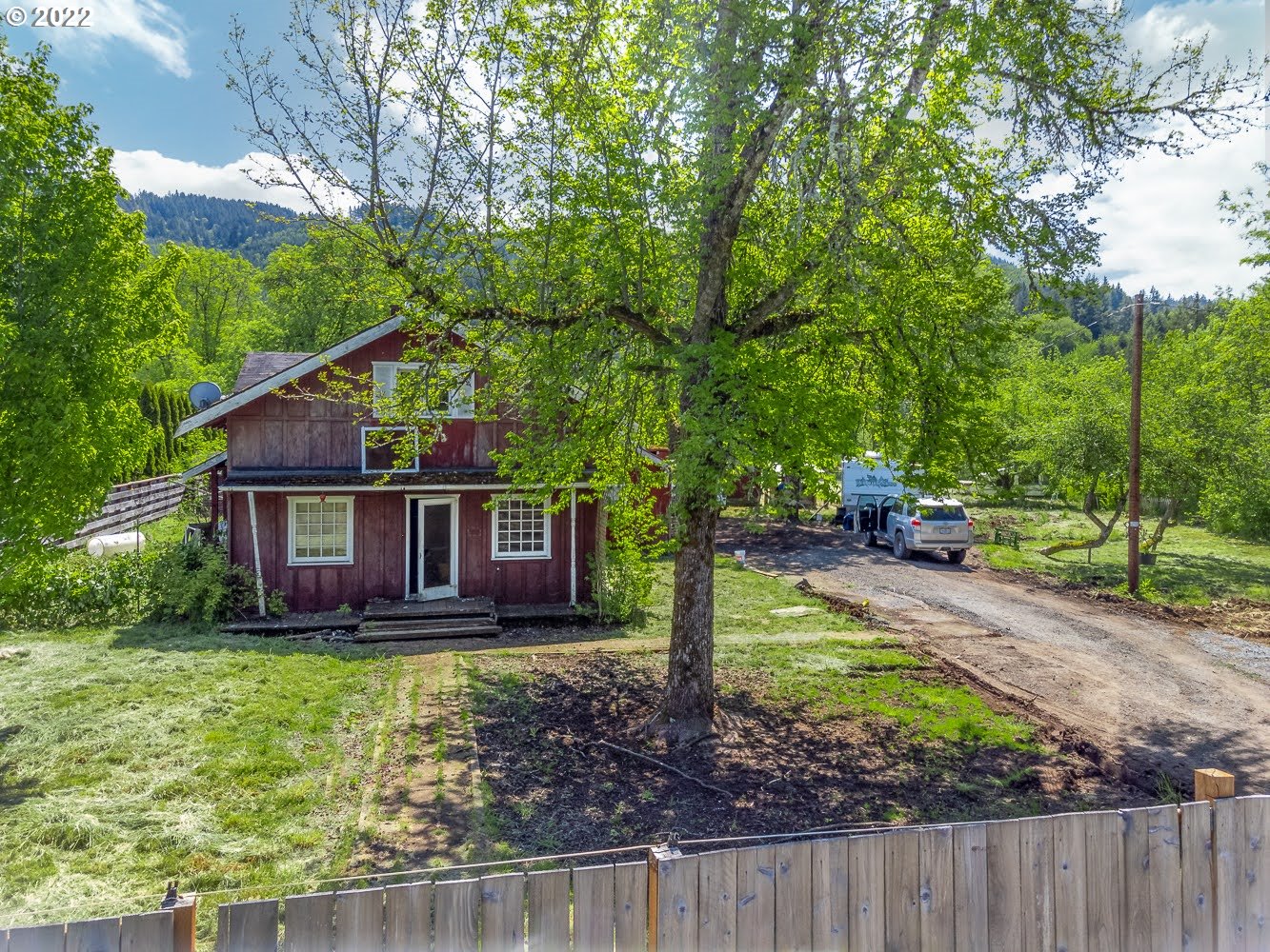 90137 Marcola Road Springfield, OR 97478 - Photo 1 of 5 a view of a house with backyard and sitting area