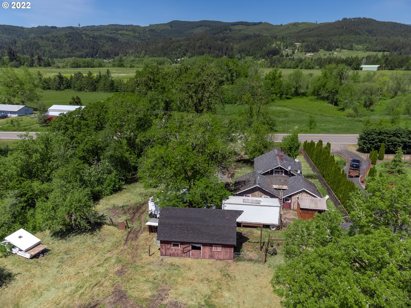 90137 Marcola Road Springfield, OR 97478 - Photo 2 of 5 an aerial view of a house with mountain view