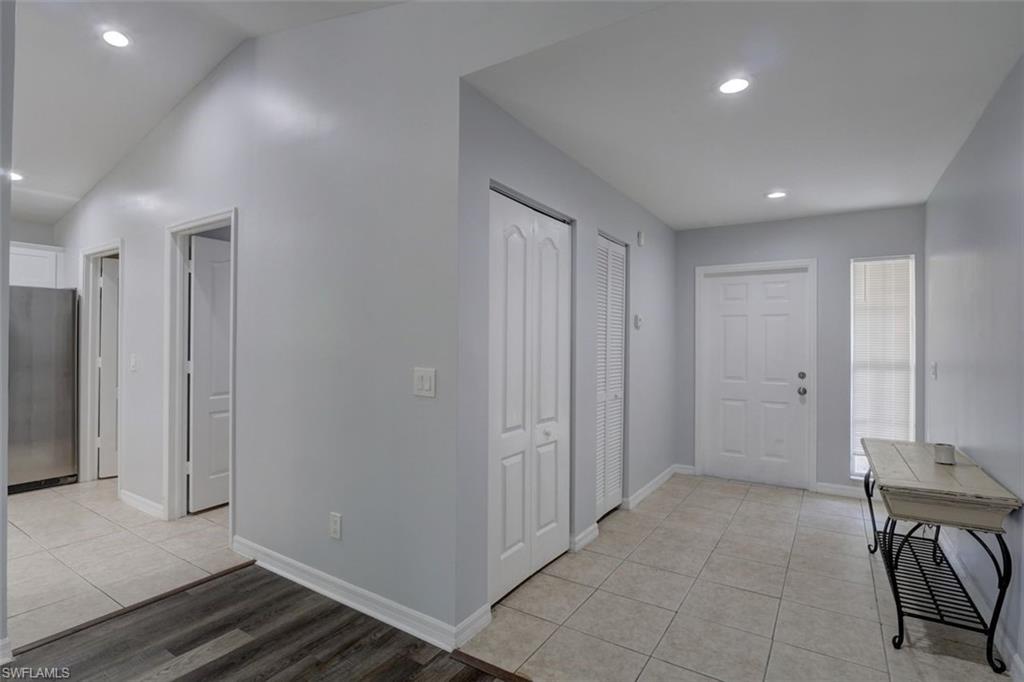 2812 4th Street Southwest Lehigh Acres, FL 33976 - Photo 14 of 34 a view of a hallway with a furniture