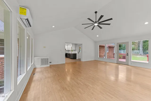 a bath room with a toilet and a bath tub