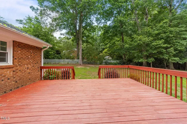 a white toilet sitting next to a window