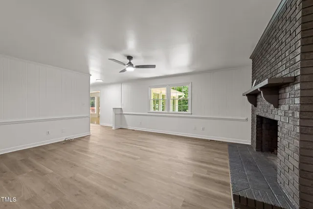 a kitchen with granite countertop a sink and cabinets
