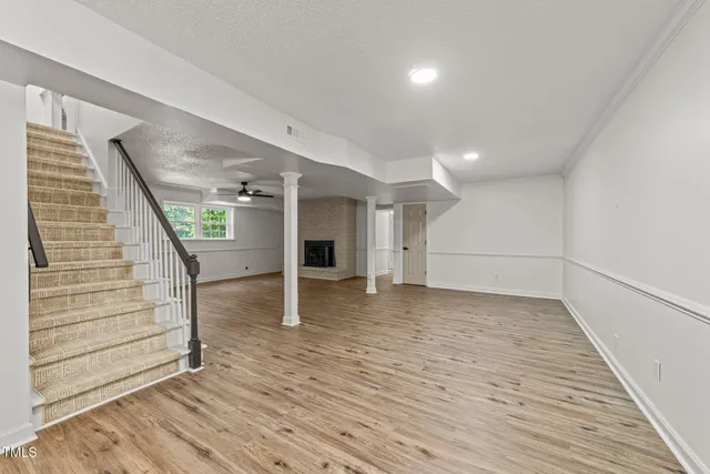 a view of a hallway with a white door