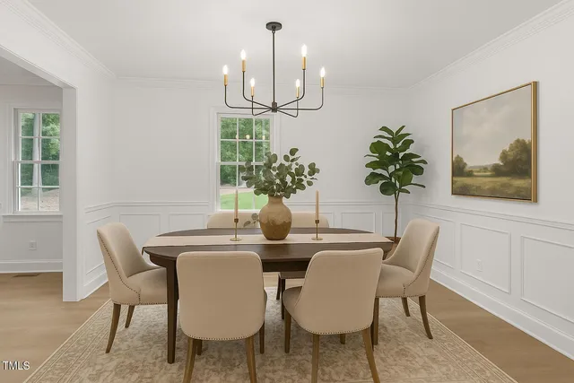 a large kitchen with cabinets and stainless steel appliances