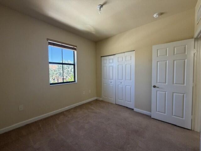 23765 Southwest 118 Avenue, Unit 23765 Homestead, FL 33032 - Photo 16 of 36 an empty room with windows