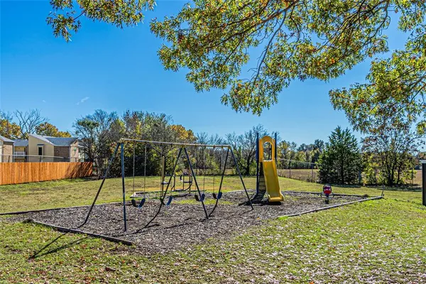 a view of swimming pool with trees