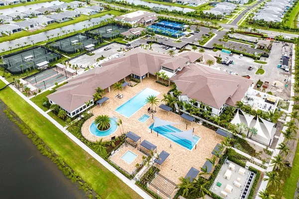 a view of a swimming pool and a chair