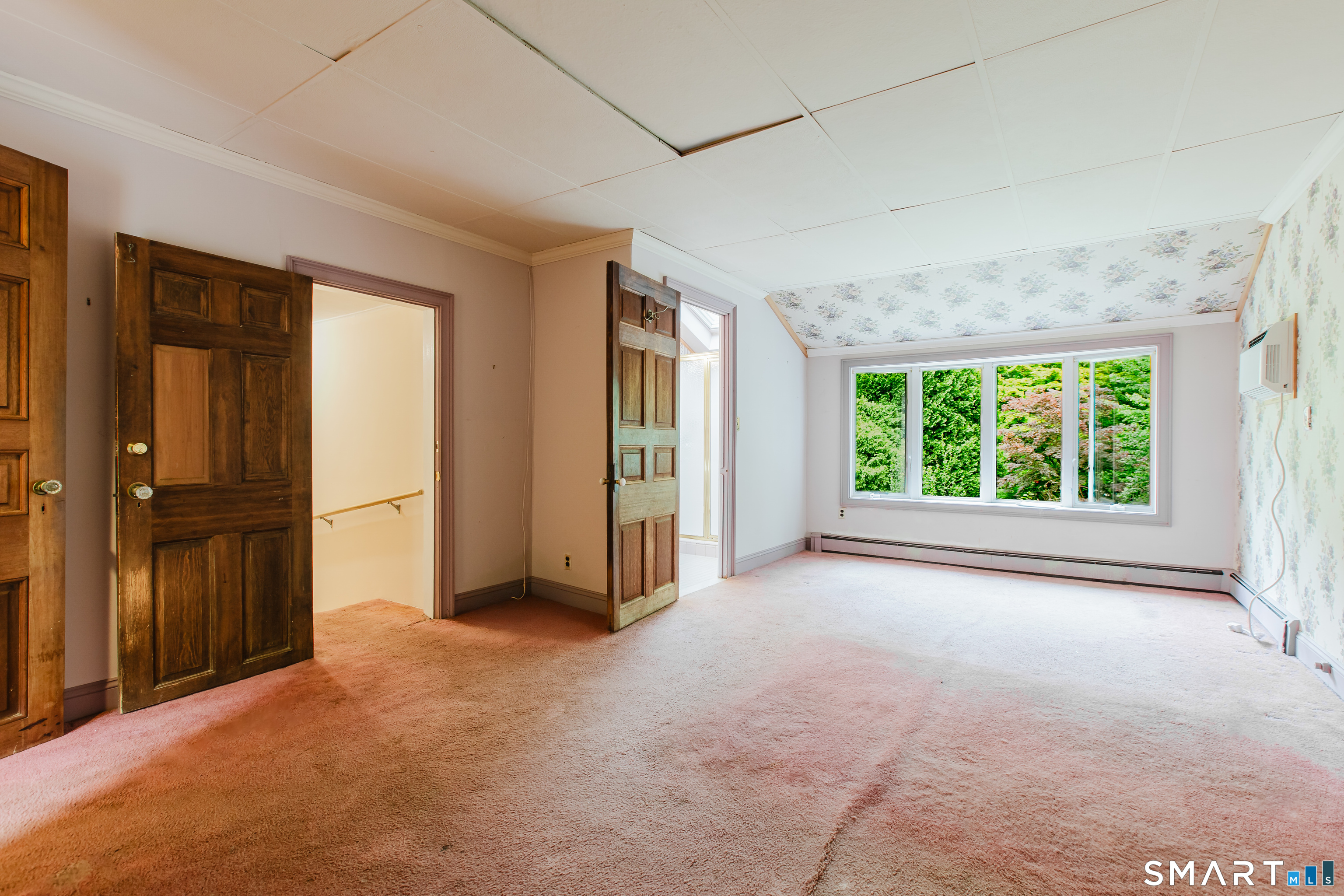 75 Westwood Road Stamford, CT 06902 - Photo 14 of 40 Colossal Primary Bedroom Suite w/ carpeting (plywood under)