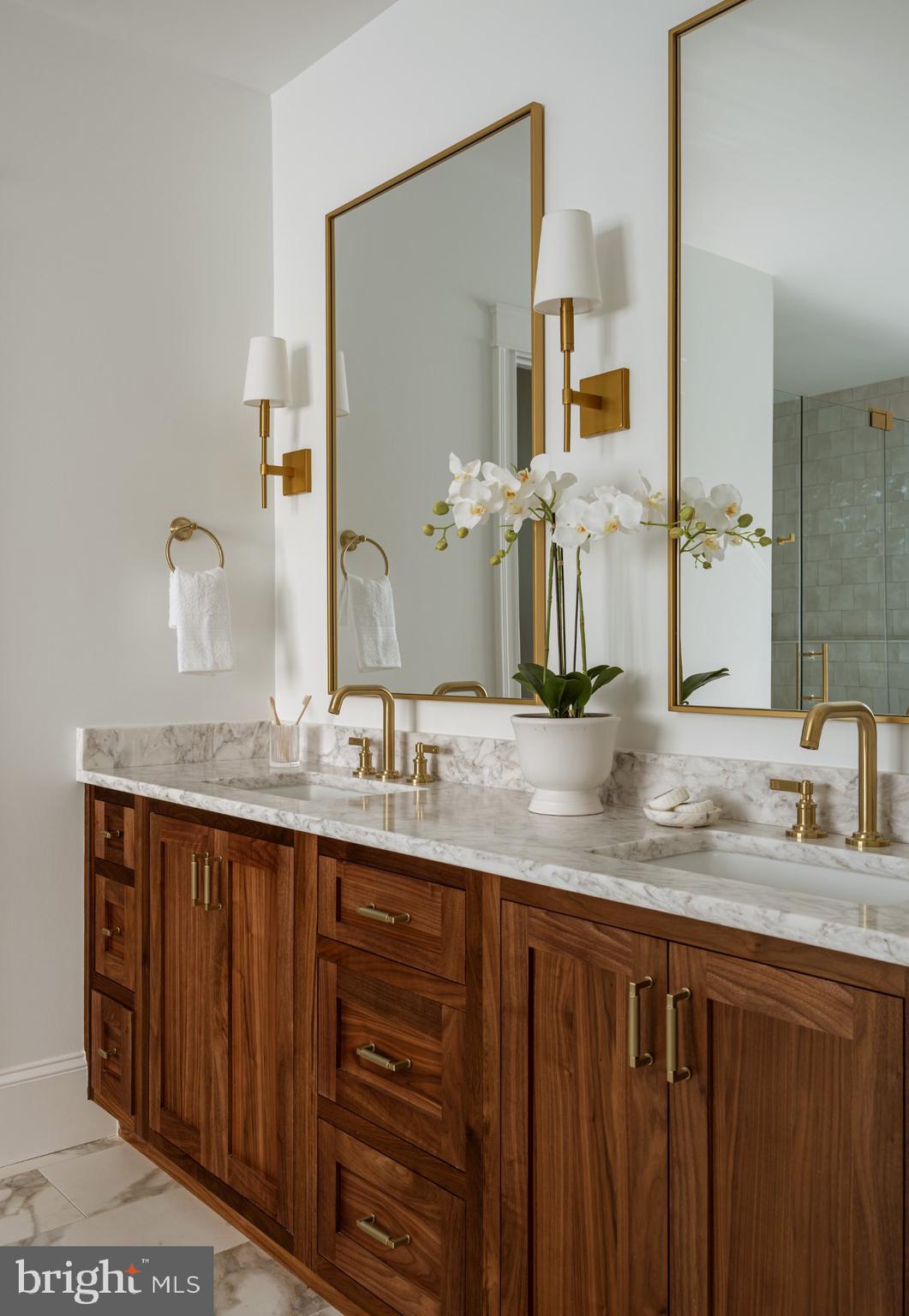 502 North Jackson Street Arlington, VA 22201 - Photo 18 of 21 a bathroom with double sink and a mirror