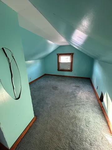 view of a room with a chandeliers