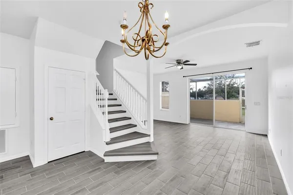 a view of entryway with wooden floor