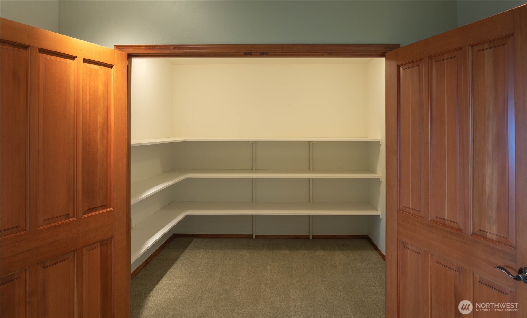 975 Simmons Road Port Angeles, WA 98362 - Photo 34 of 40 a view of walk in closet with empty racks