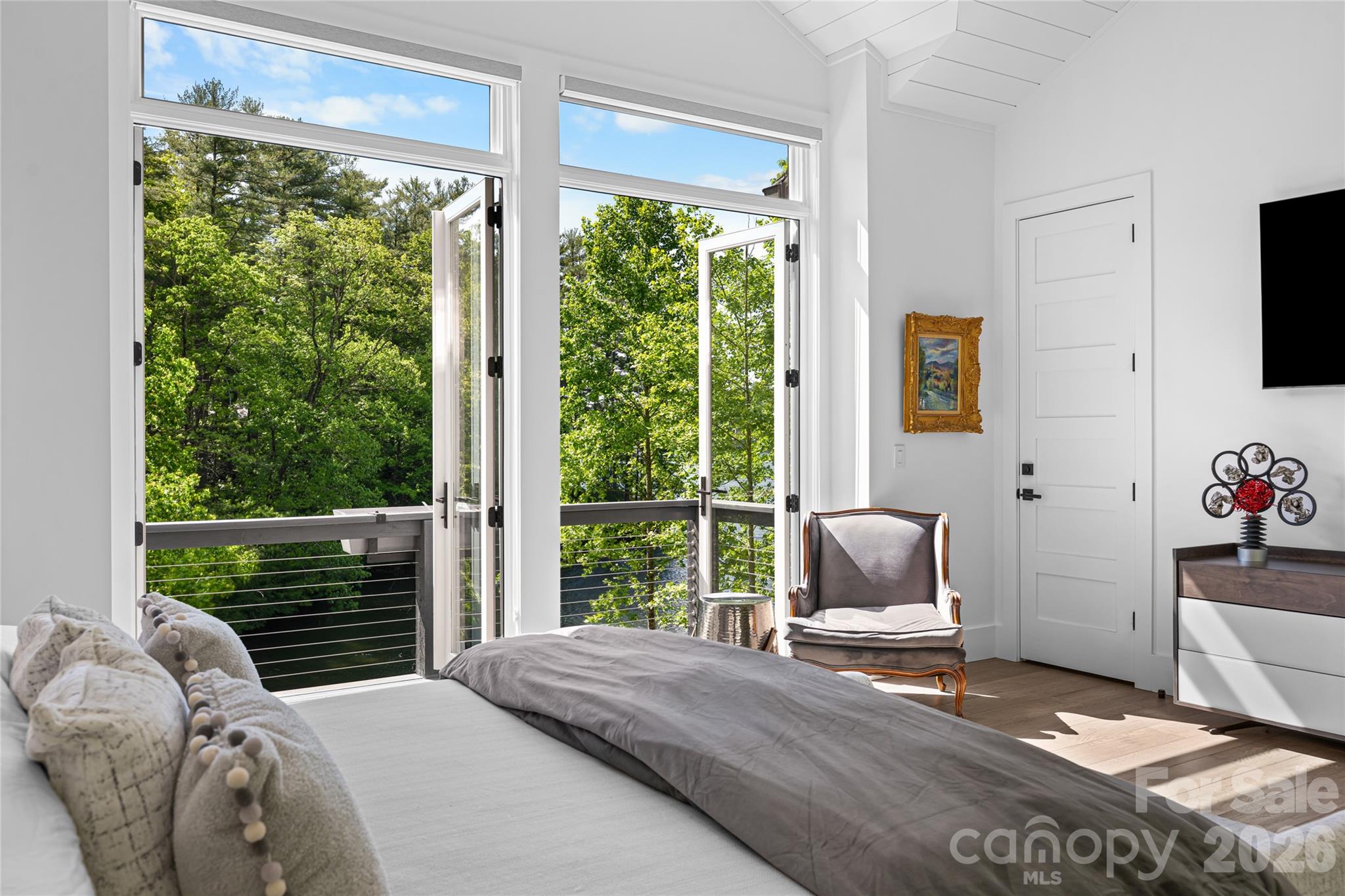 2235 Cold Mountain Road Lake Toxaway, NC 28747 - Photo 15 of 47 a bedroom with furniture and a window