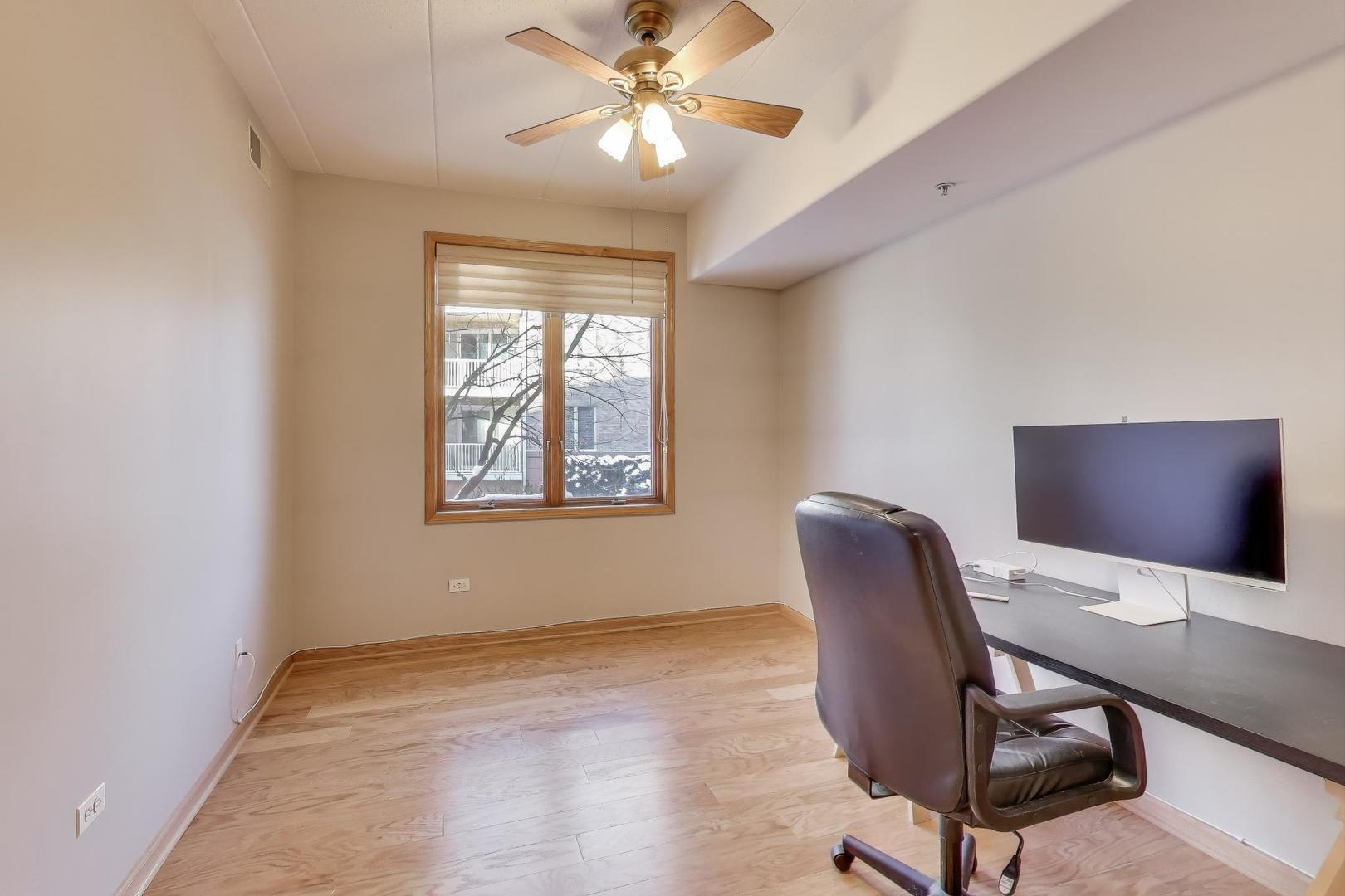 1715 Pavilion Way, Unit 206 Park Ridge, IL 60068 - Photo 13 of 19 a workspace with furniture and chandelier