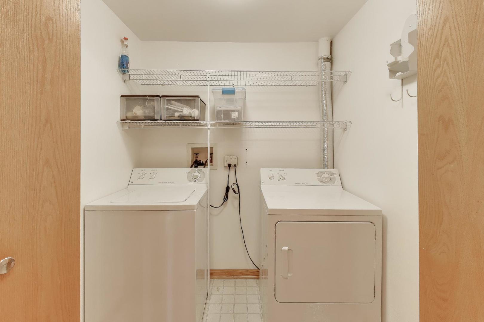 1715 Pavilion Way, Unit 206 Park Ridge, IL 60068 - Photo 16 of 19 a utility room with dryer and washer