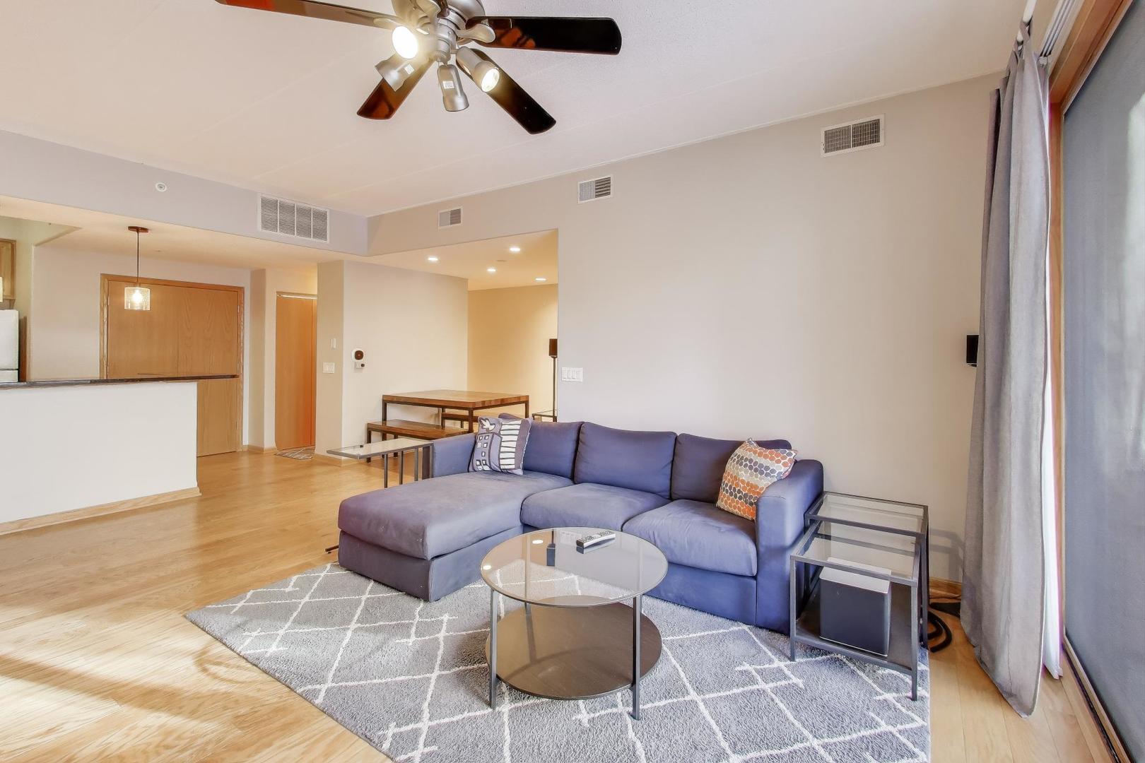 1715 Pavilion Way, Unit 206 Park Ridge, IL 60068 - Photo 3 of 19 a living room with furniture and a wooden floor