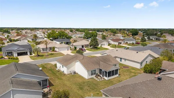 an aerial view of residential house with outdoor space