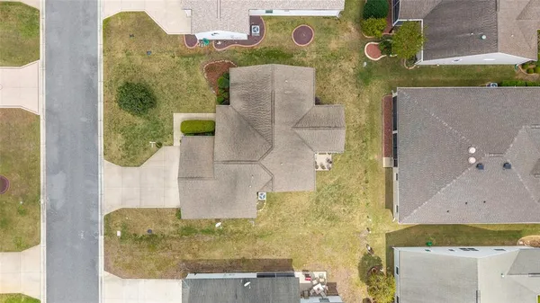 an aerial view of residential building with parking space