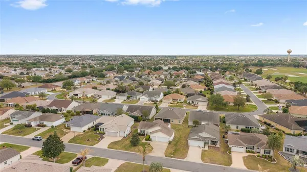 an aerial view of residential building and lake view
