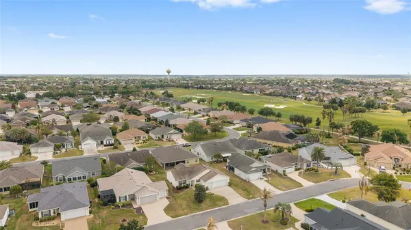 an aerial view of residential building with parking space
