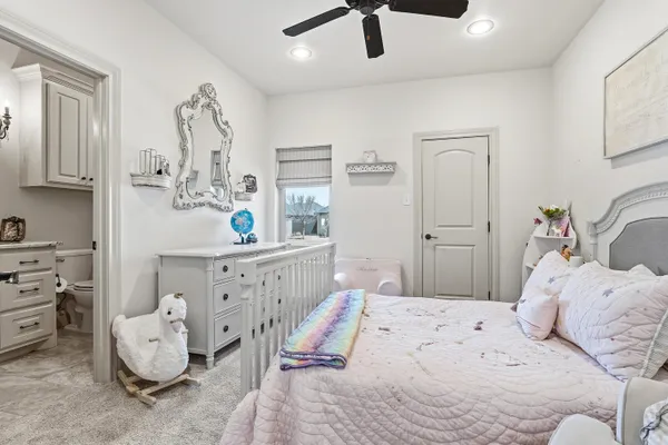 a bedroom with a bed and furniture