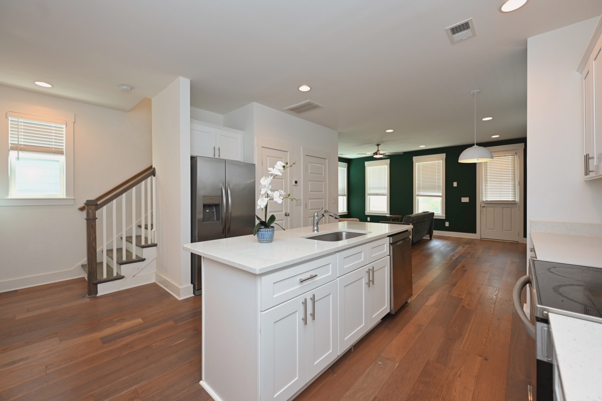 422 Creative Way Madison, TN 37115 - Photo 11 of 31 a large kitchen with a lot of counter space and a wooden floor