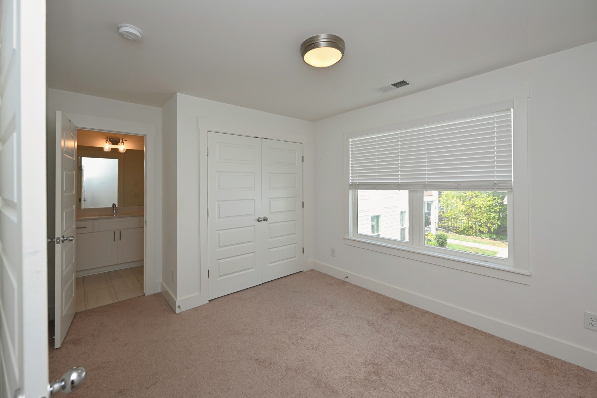 422 Creative Way Madison, TN 37115 - Photo 25 of 31 an empty room with windows and closet