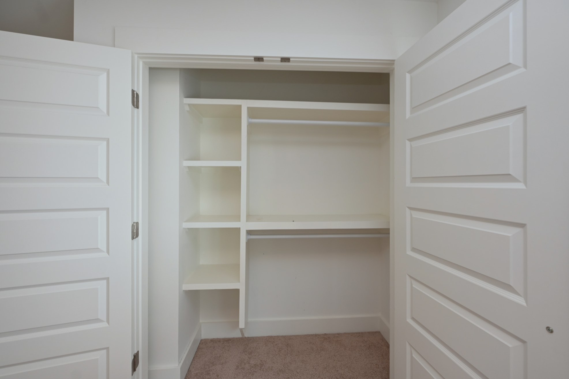 422 Creative Way Madison, TN 37115 - Photo 26 of 31 a view of walk in closet with empty racks